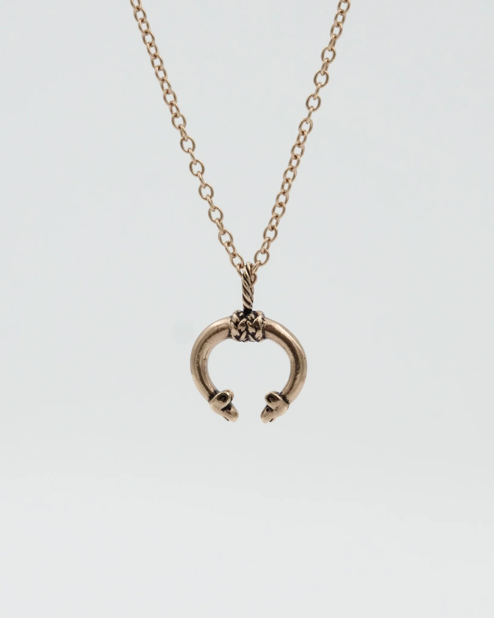 Held Hirvenpää pendant bronze