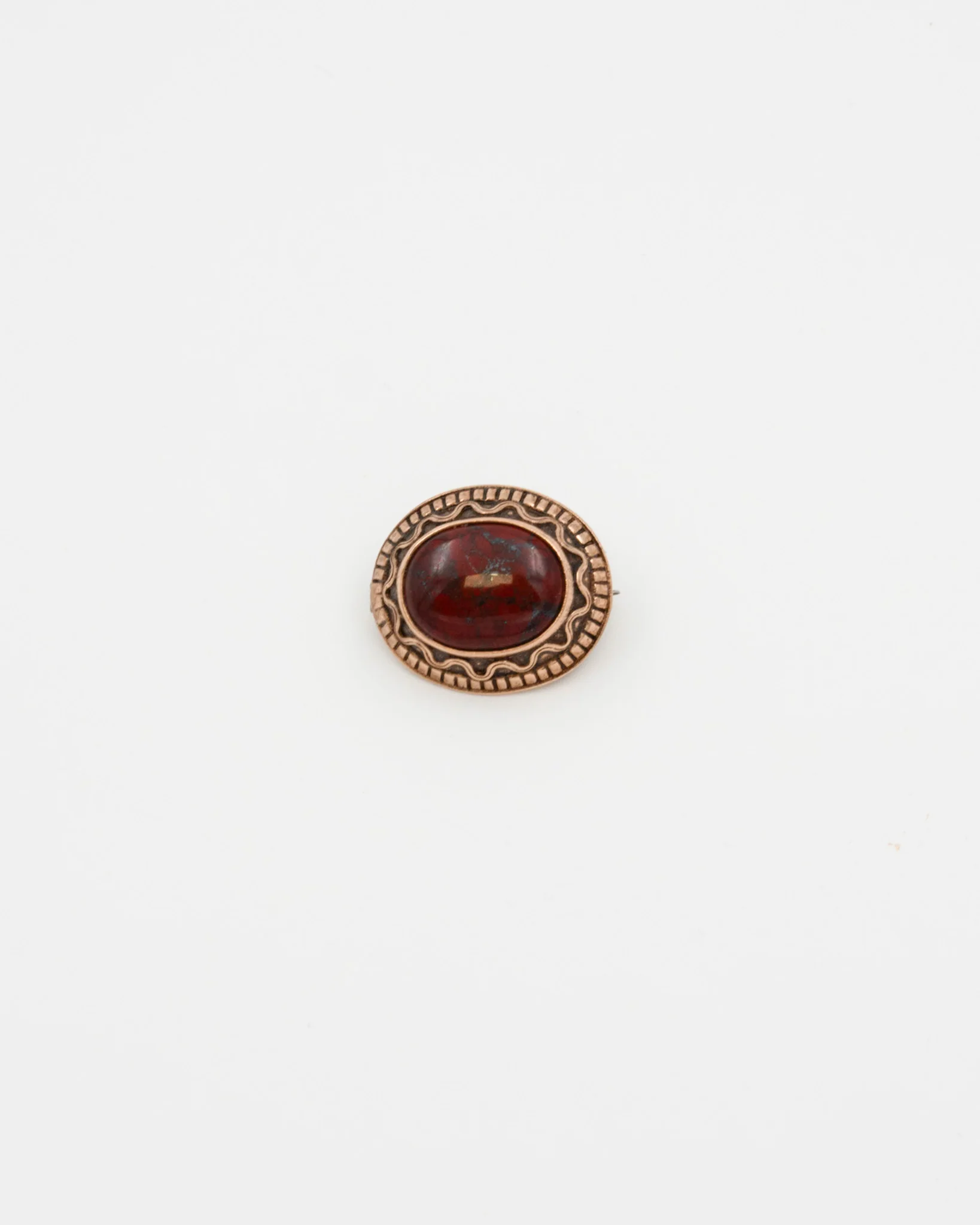 Held stone buckle bronze jasper
