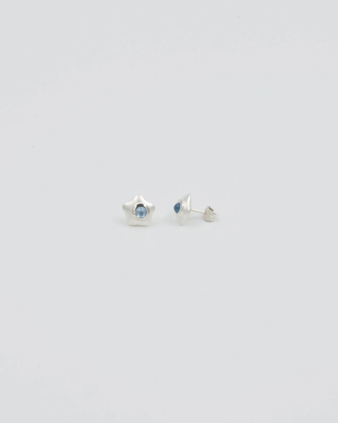 Kept stud earrings in aquamarine silver