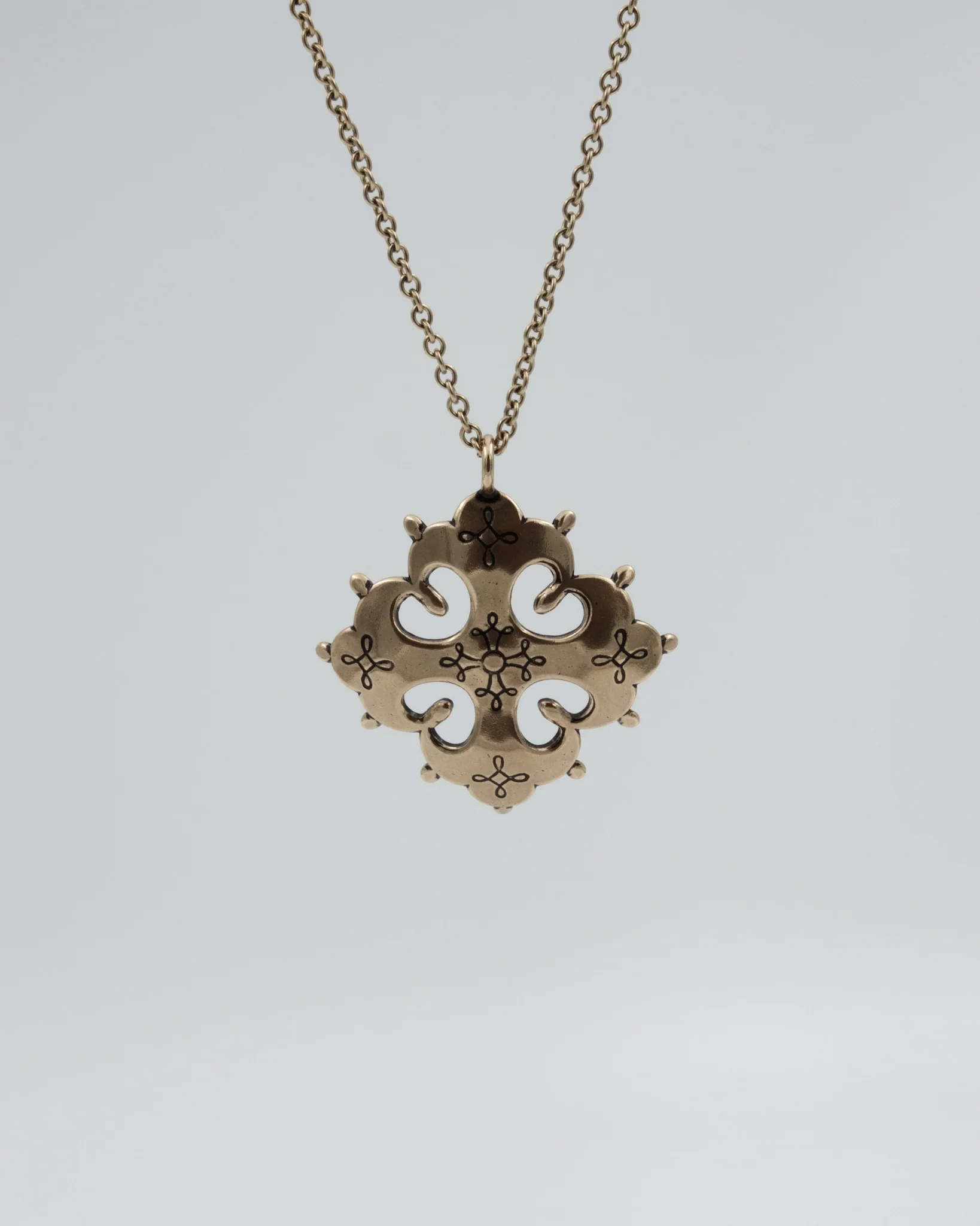 Kept border-Karelian cross pendant bronze