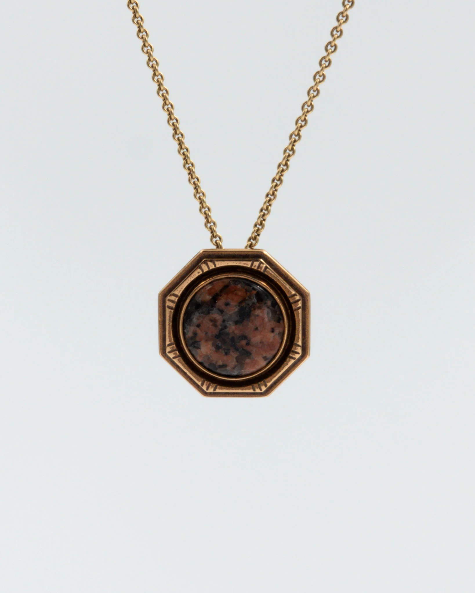 Kept Viapori 250 years buckle pendant bronze red granite